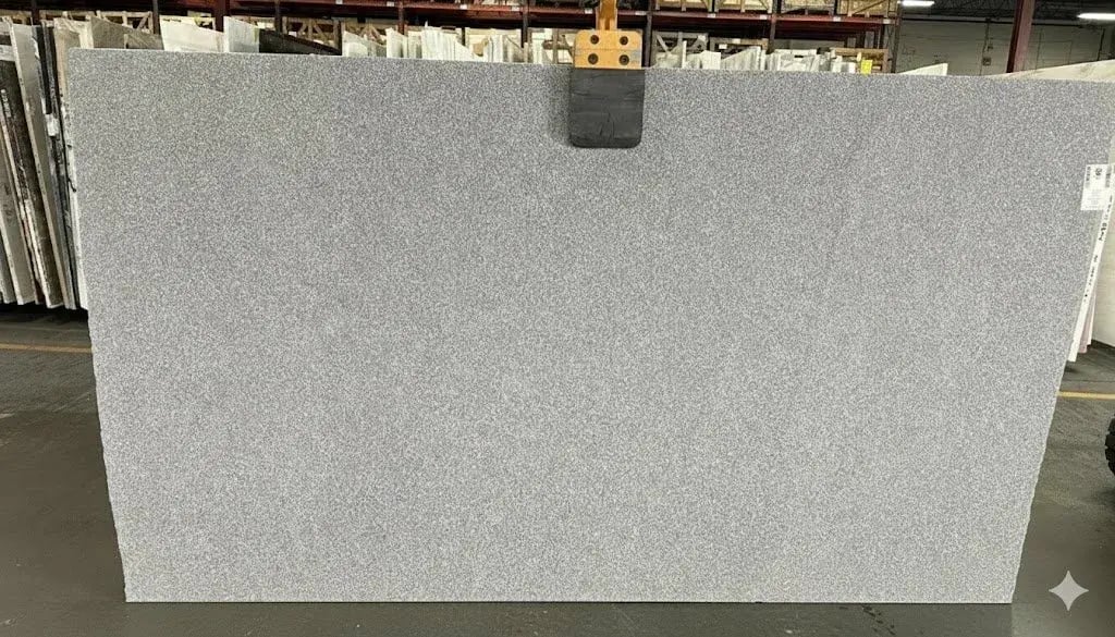 Barre Gray granite slab from Vermont showing the consistent gray color that made it famous for monuments and memorials across America