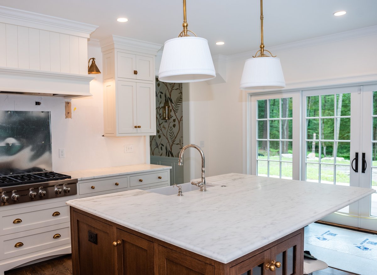 Suede-finish Vermont Danby marble kitchen island countertop in a Concord, Massachusetts home
