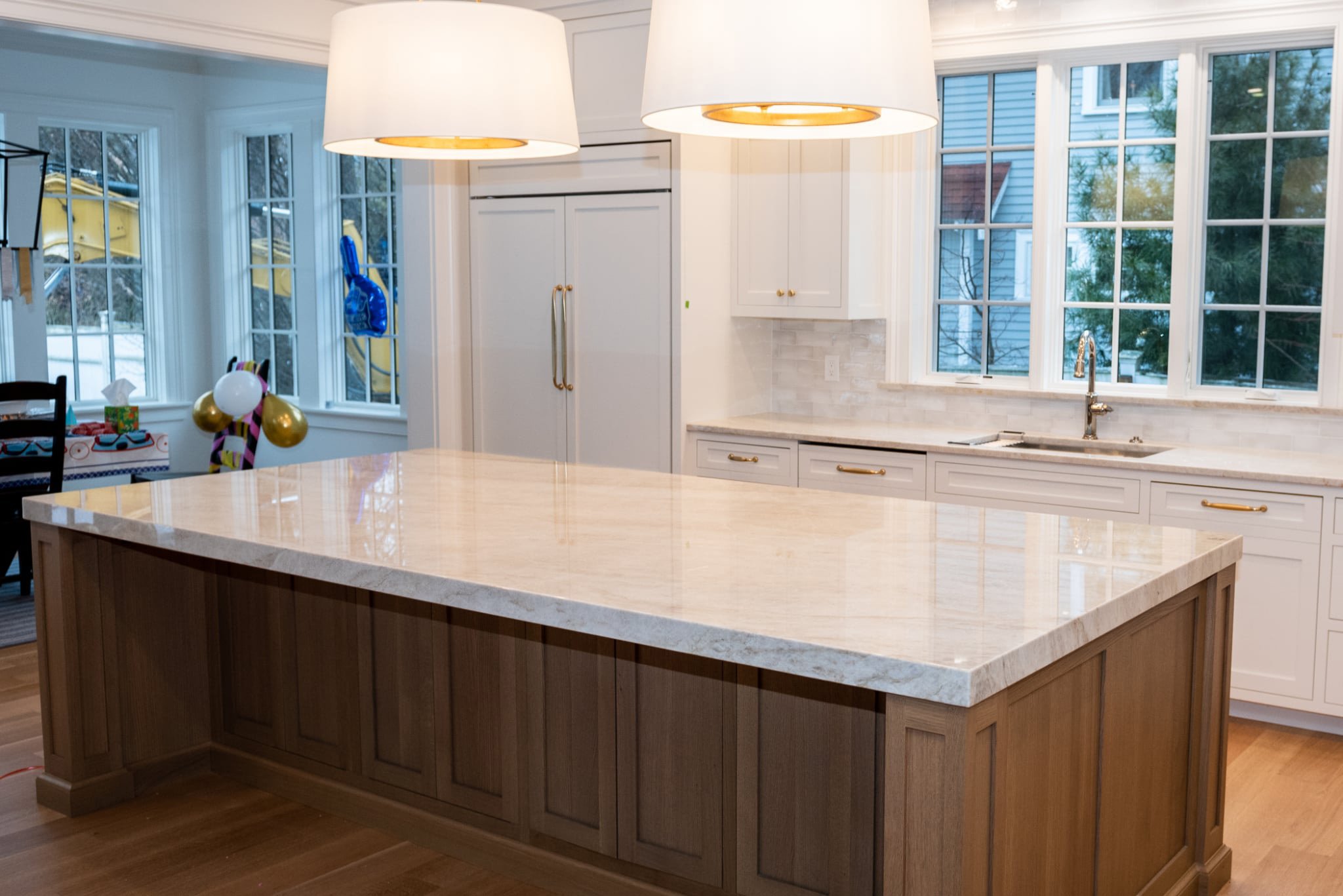 taj-mahal-quartzite-island-mitered-edge-sink-wall-needham