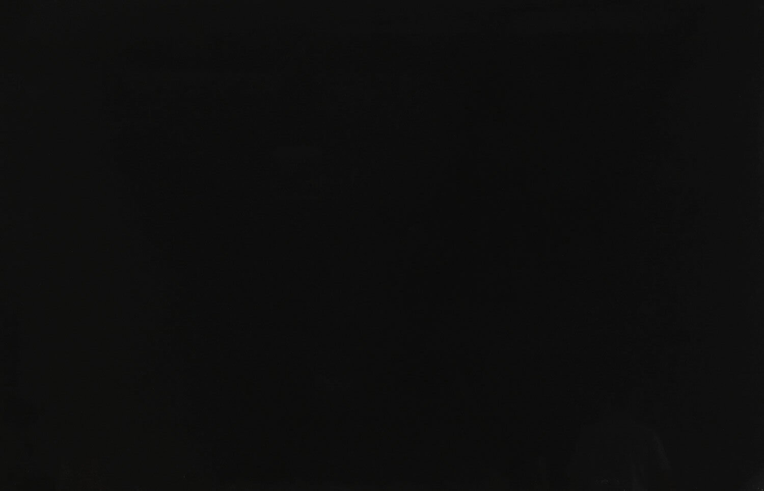 Absolute Black granite countertops with a deep black, polished finish, ideal for kitchen countertops, vanities, and fireplaces by Granite Guy Inc.