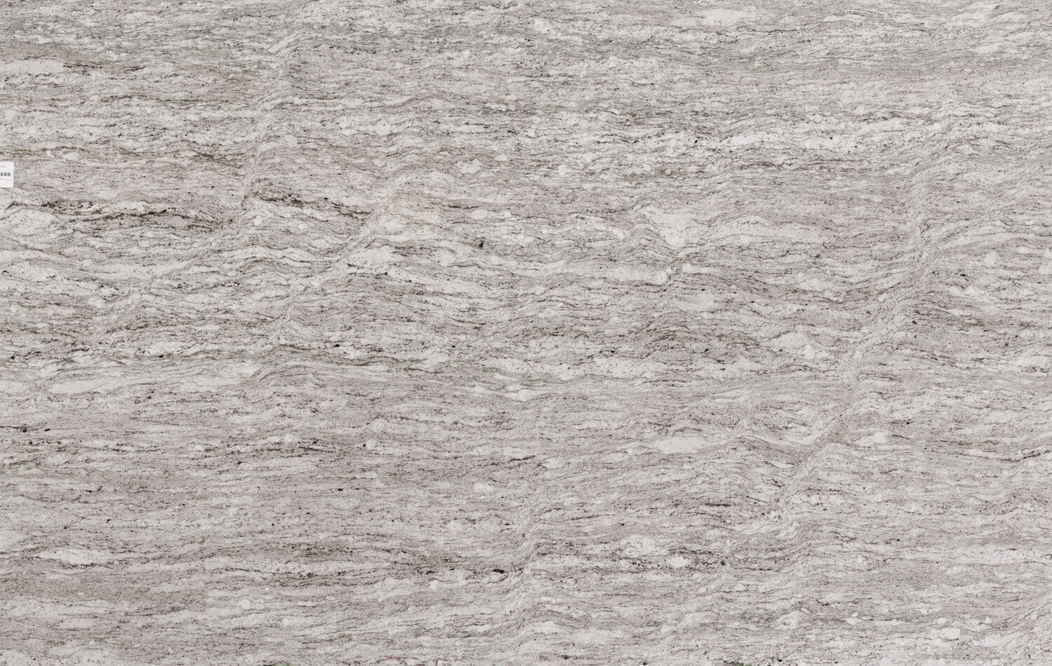 Amazon White granite countertops with soft white and gray pattern, perfect for kitchen countertops, vanities, and fireplaces by Granite Guy Inc.
