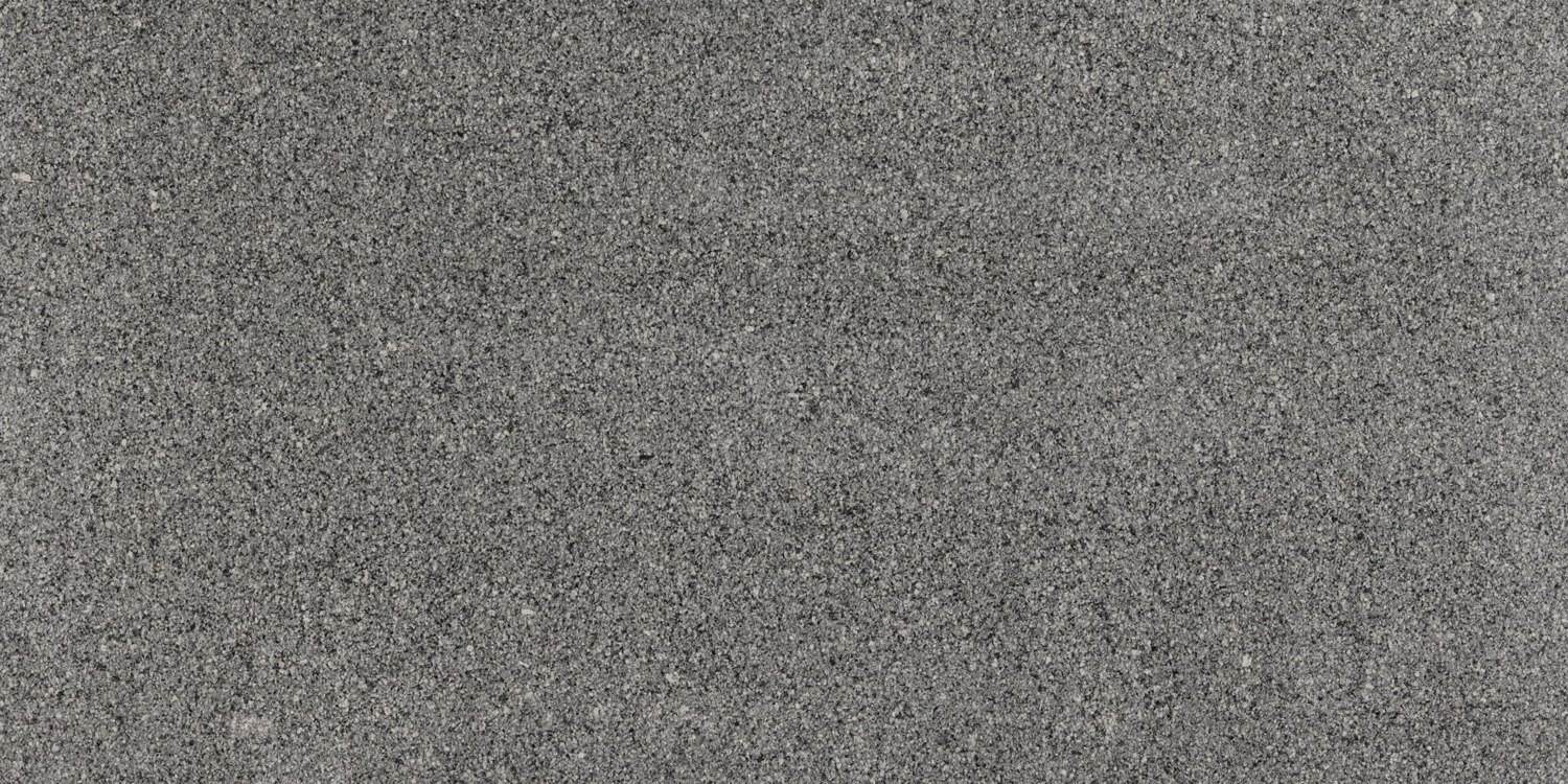 Azul Platino granite countertops with a soft gray pattern and subtle speckles, ideal for kitchen countertops, vanities, and fireplaces by Granite Guy Inc.