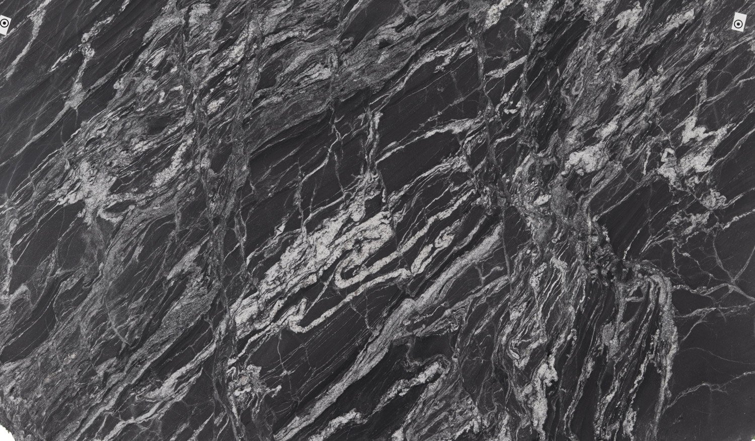 Black Forest granite countertops with a deep black base, striking white patterns, and a textured leather finish, ideal for kitchens countertops by Granite Guy Inc.