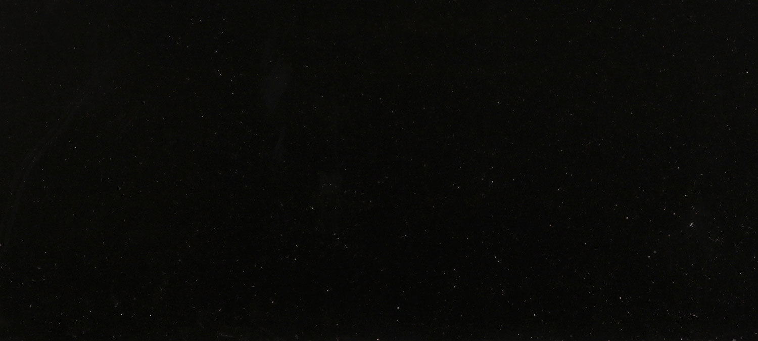 Black Galaxy granite countertops with deep black color and gold speckles, ideal for kitchen countertops, vanities, and fireplaces by Granite Guy Inc.