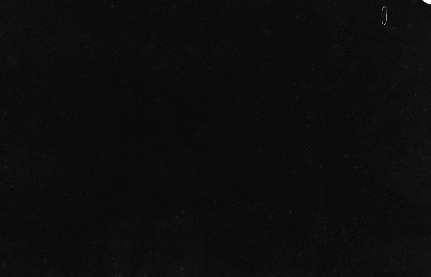 Black Pearl granite countertops with a deep black tone, perfect for kitchen countertops, vanities, fireplaces, bars and more by Granite Guy Inc.