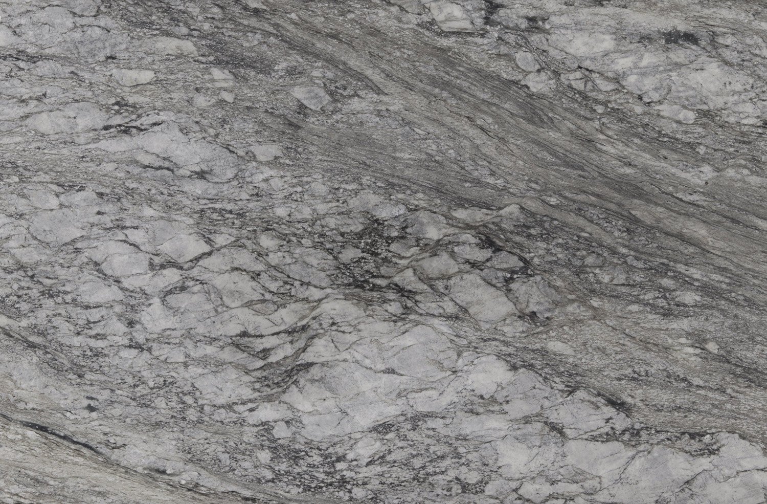 Blue Dunes granite countertops with soft gray and white patterns, perfect for kitchen countertops, vanities, and fireplaces by Granite Guy Inc.