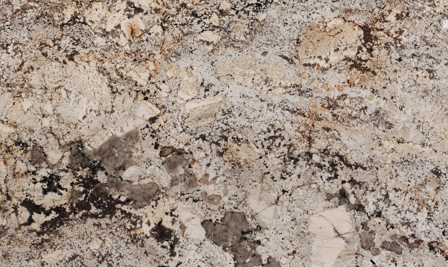 Branco Torrone granite countertops with warm beige, brown, and cream patterns, perfect for kitchen countertops and vanities by Granite Guy Inc.