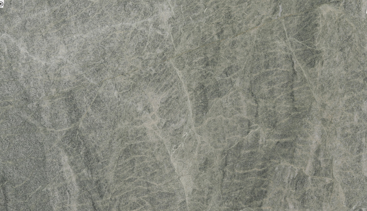 Costa Esmeralda granite countertops with soft green tones and natural patterns, perfect for kitchen countertops and vanities by Granite Guy Inc.