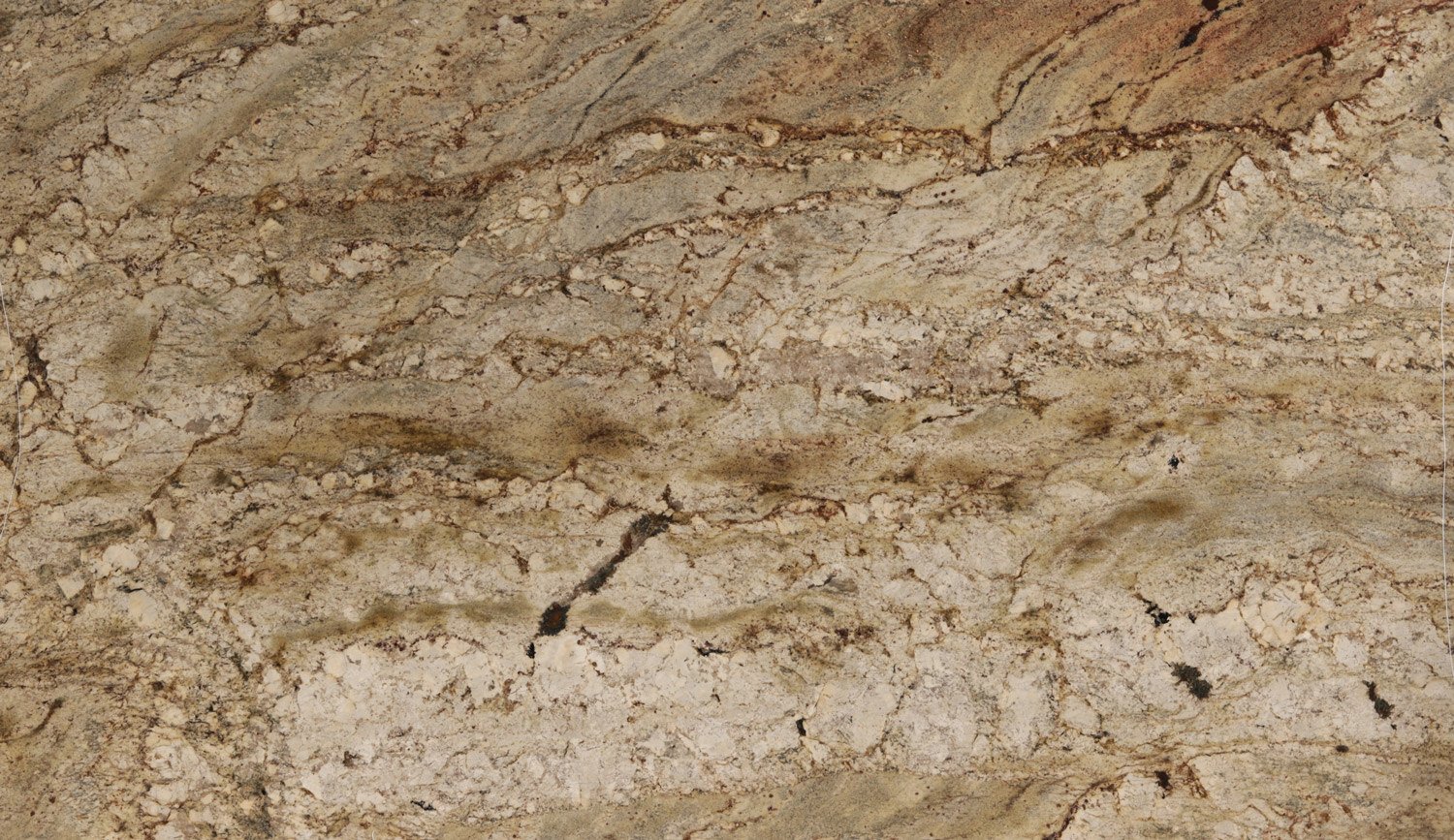 Crema Bordeaux granite countertops with rich red, gold, and beige patterns, perfect for kitchen countertops and vanities by Granite Guy Inc.