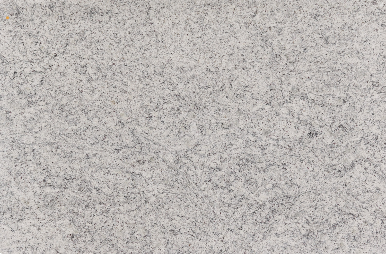 Dallas White granite countertops with soft white and gray speckles, perfect for kitchen countertops and vanities by Granite Guy Inc.