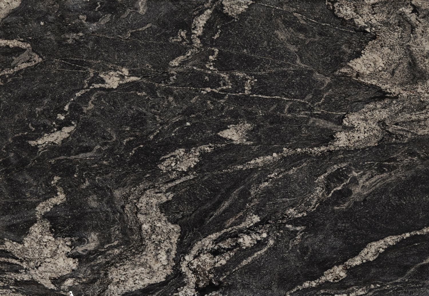 Express granite countertops with bold black and white patterns, ideal for kitchen countertops by Granite Guy Inc.