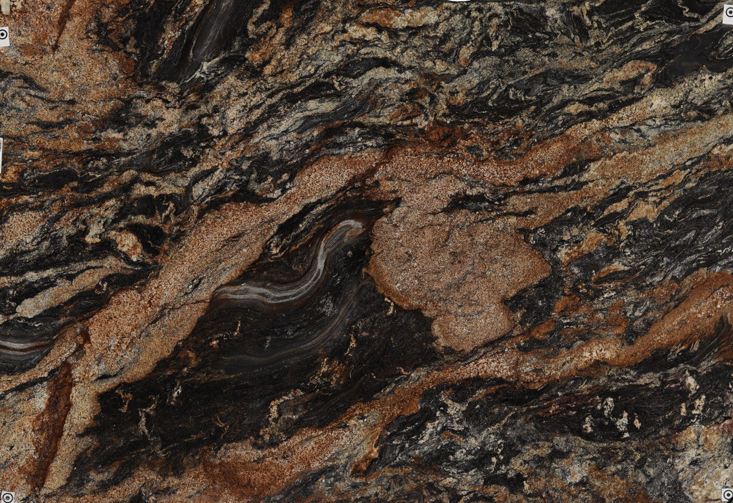Magma granite countertops with bold black, gold, and brown patterns, perfect for kitchen countertops by Granite Guy Inc.