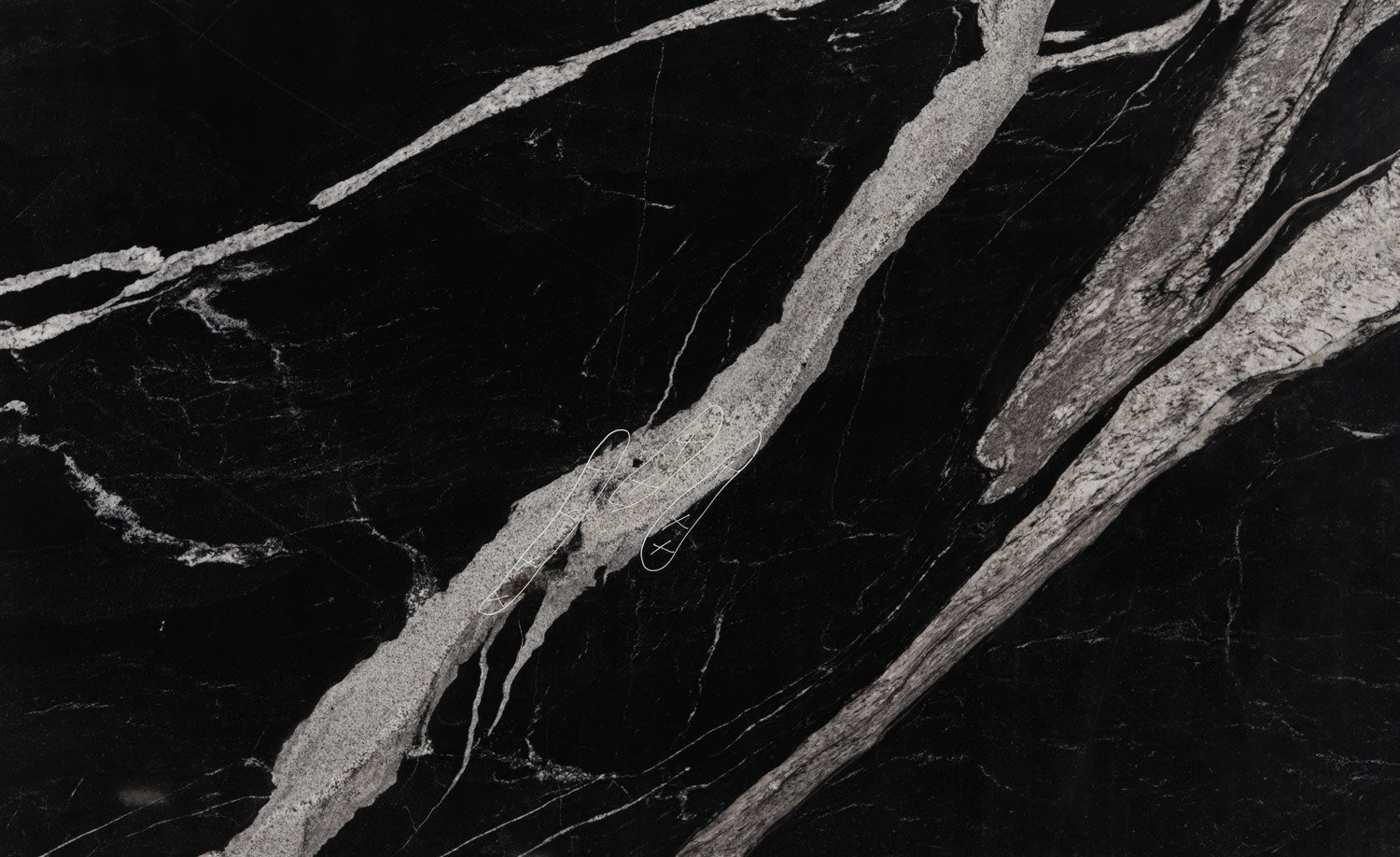 Maori granite countertops with striking black and white patterns, perfect for kitchen countertops by Granite Guy Inc.