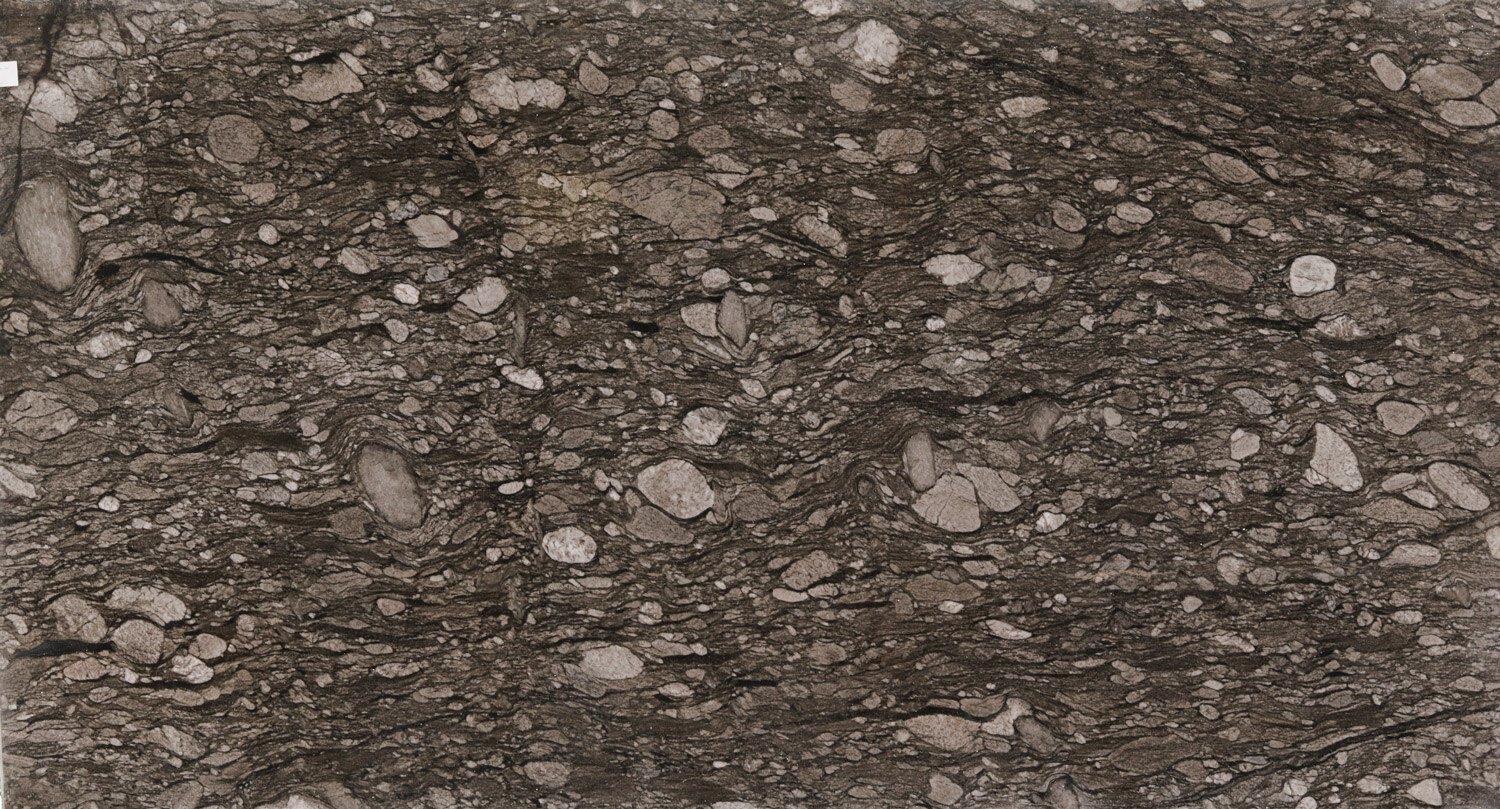 Mosaikus granite countertops with bold dark brown and gray patterns, perfect for kitchen countertops and fireplaces by Granite Guy Inc.