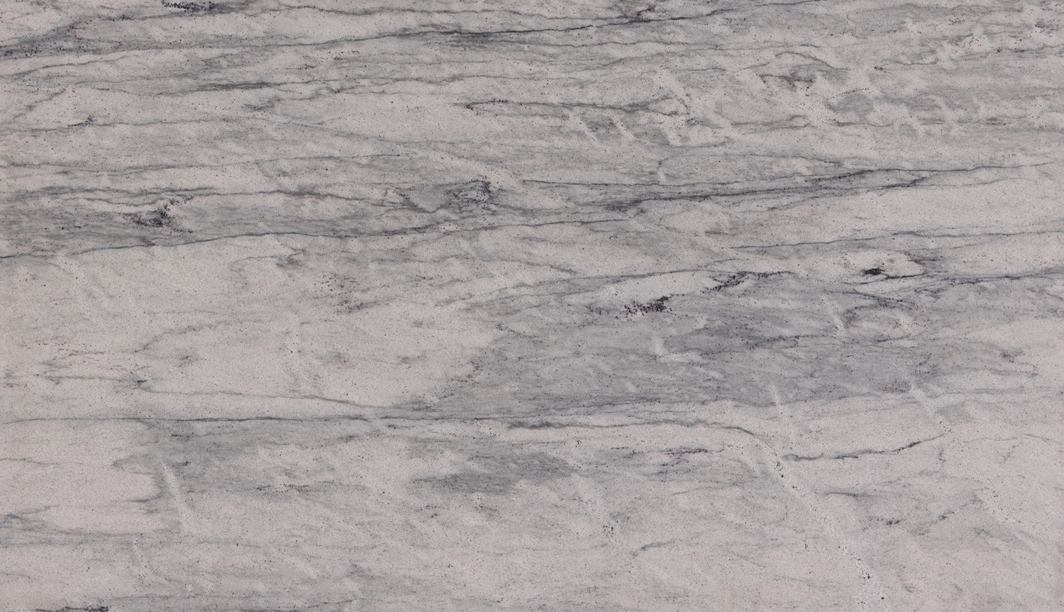 New River White granite countertops with soft white and gray veining, perfect for kitchen countertops by Granite Guy Inc.