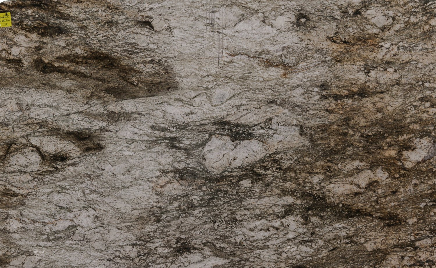 Sahara Sky granite countertops with dramatic beige, brown, and gray patterns, perfect for kitchen countertops by Granite Guy Inc.