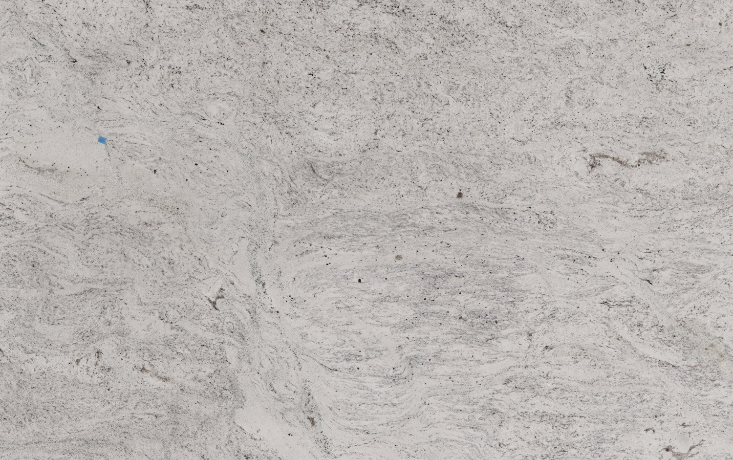 Salinas White granite countertops with soft white and gray flowing patterns, perfect for kitchen countertops by Granite Guy Inc.