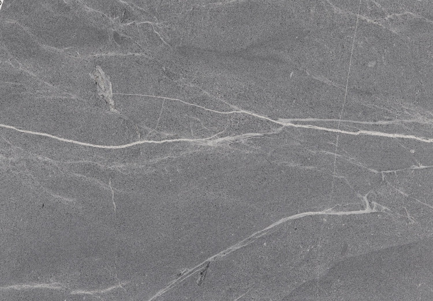 Silver Grey granite countertops with a sleek gray base and subtle white patterns, perfect for kitchen countertops by Granite Guy Inc.