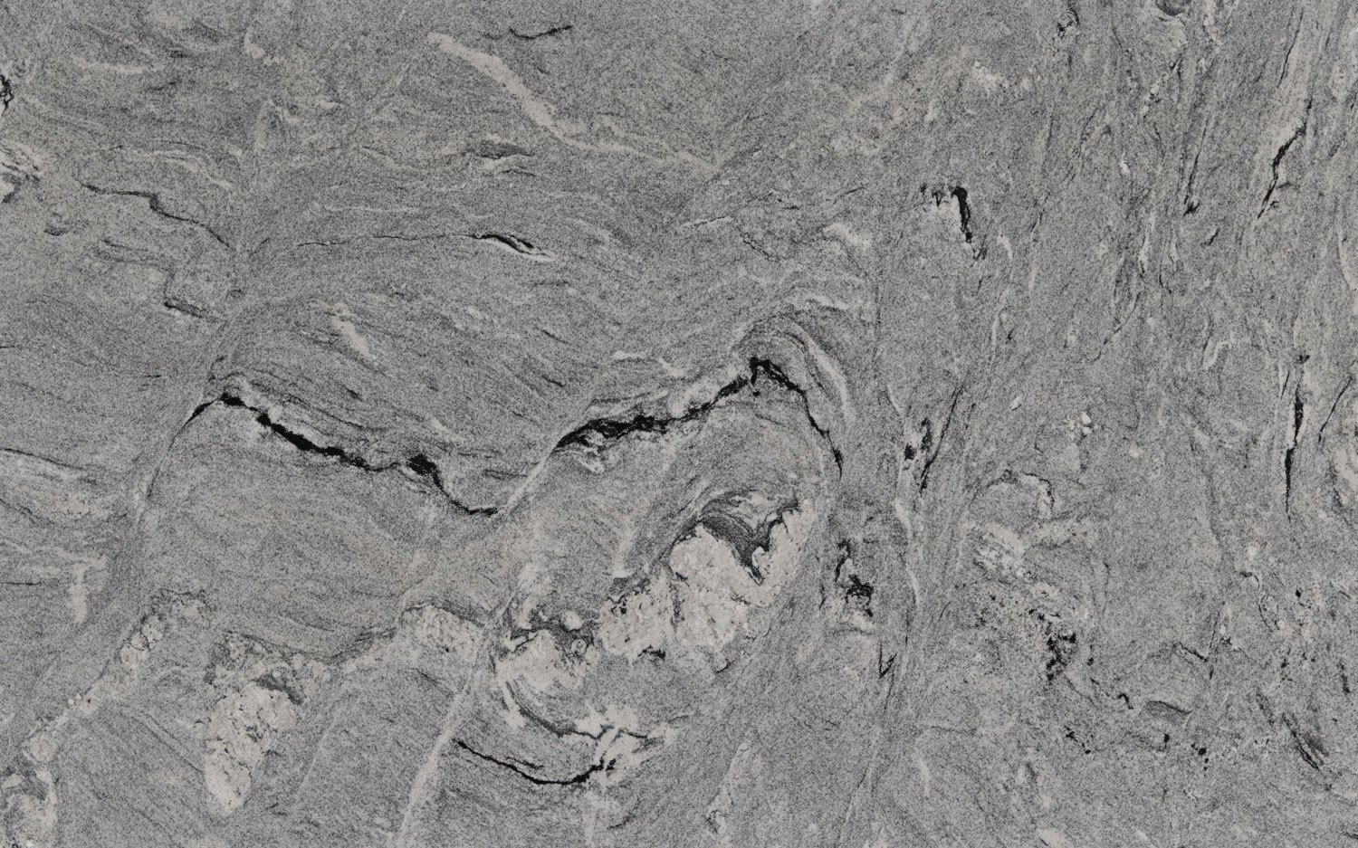 Viscon White granite countertops with bold gray and black patterns, ideal for kitchen countertops, vanities, and fireplaces by Granite Guy Inc.