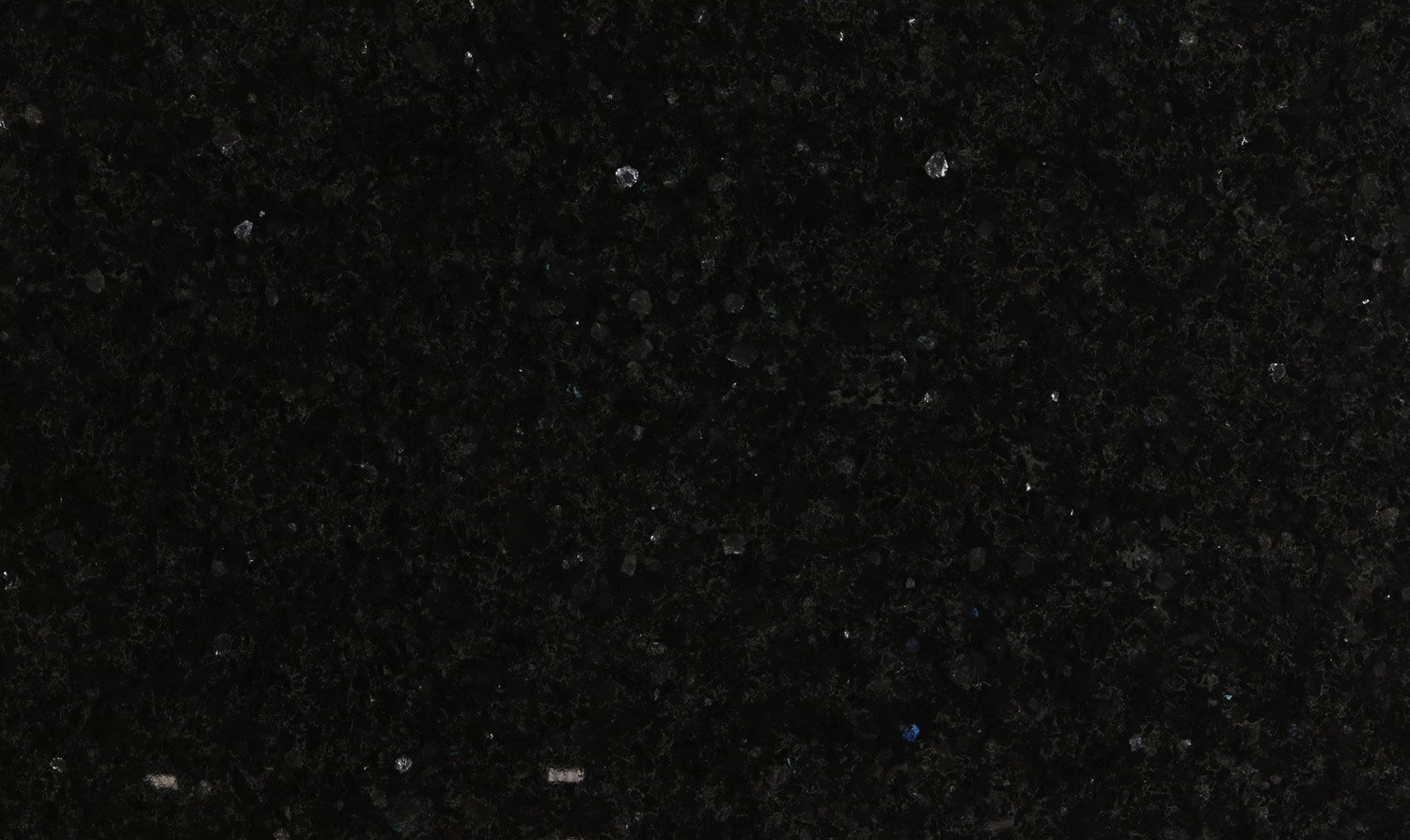 Volga Blue granite countertops with deep black tones and iridescent blue flecks, perfect for kitchen countertops by Granite Guy Inc.