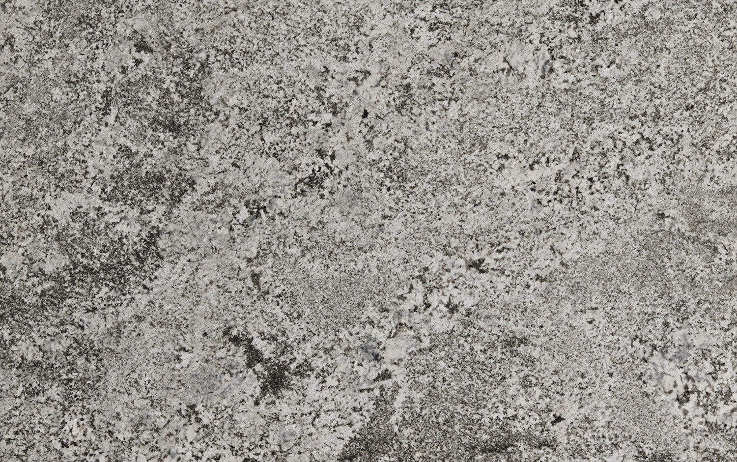 Whisper White granite countertops with soft white tones and intricate patterns, perfect for kitchen countertops by Granite Guy Inc.