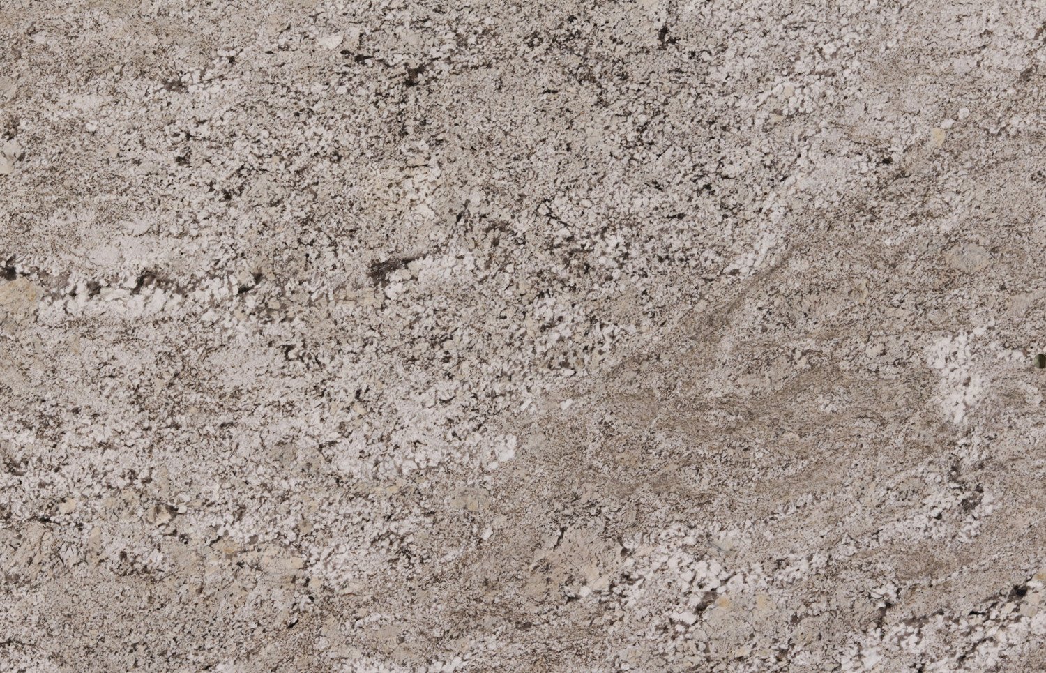White Taupe granite countertops with warm beige tones and intricate patterns, perfect for kitchen countertops by Granite Guy Inc.