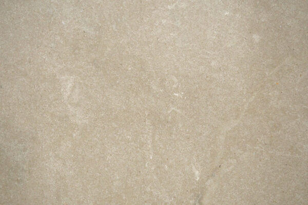Limestone Avorio countertops in a warm beige tone with subtle movement, great for kitchen or bathroom countertops. Limestone by Granite Guy Inc.