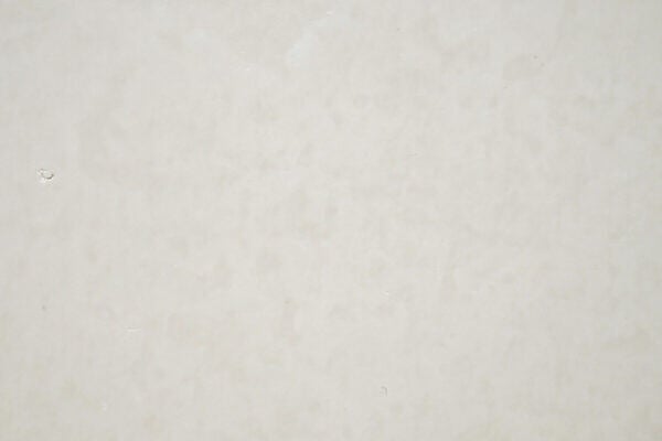 Limestone Cream de Lyon countertops in a light cream tone with subtle cloudy pattern, great for kitchen countertops. Limestone by Granite Guy Inc.