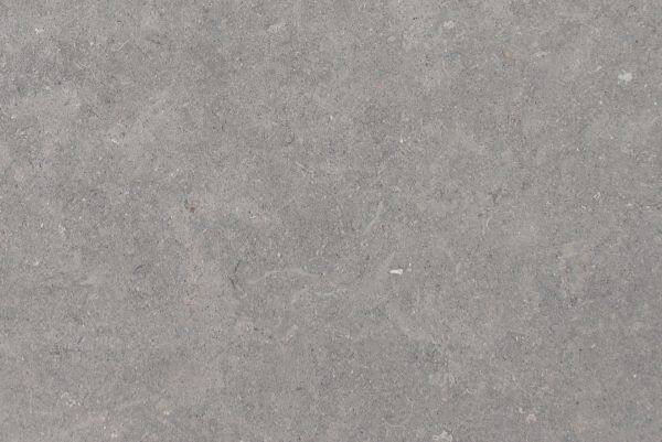 Limestone Grigio Argento countertops in a smooth gray tone with faint fossil pattern, great for kitchen countertops. Limestone by Granite Guy Inc.