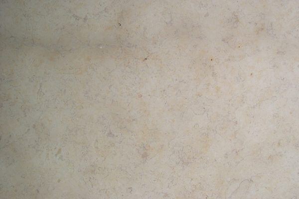 Limestone Hebron Gold countertops in a creamy beige tone with soft golden movement, great for kitchen countertops. Limestone by Granite Guy Inc.