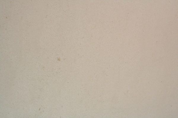 Limestone La Perla Honed countertops in a clean, uniform beige tone with fine texture, great for kitchen countertops. Limestone by Granite Guy Inc.