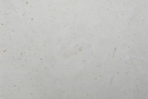Limestone Luget Honed countertops in a soft cream tone with minimal texture, great for kitchen countertops. Limestone by Granite Guy Inc.