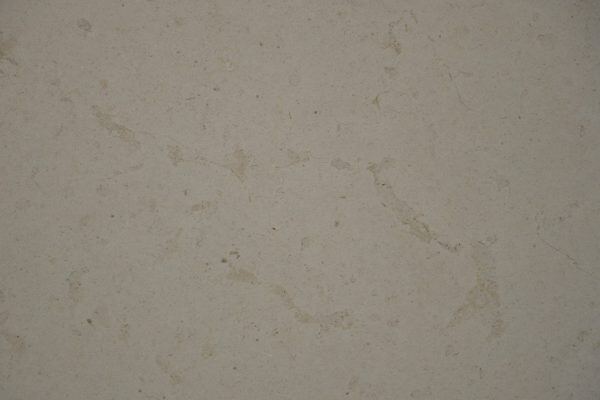Limestone Moleanos Honed countertops in a soft beige tone with subtle fossil pattern, great for kitchen countertops. Limestone by Granite Guy Inc.