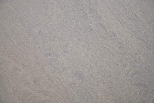 Limestone Regimental Grey countertops with flowing gray swirls and soft movement, great for kitchen countertops. Limestone by Granite Guy Inc.