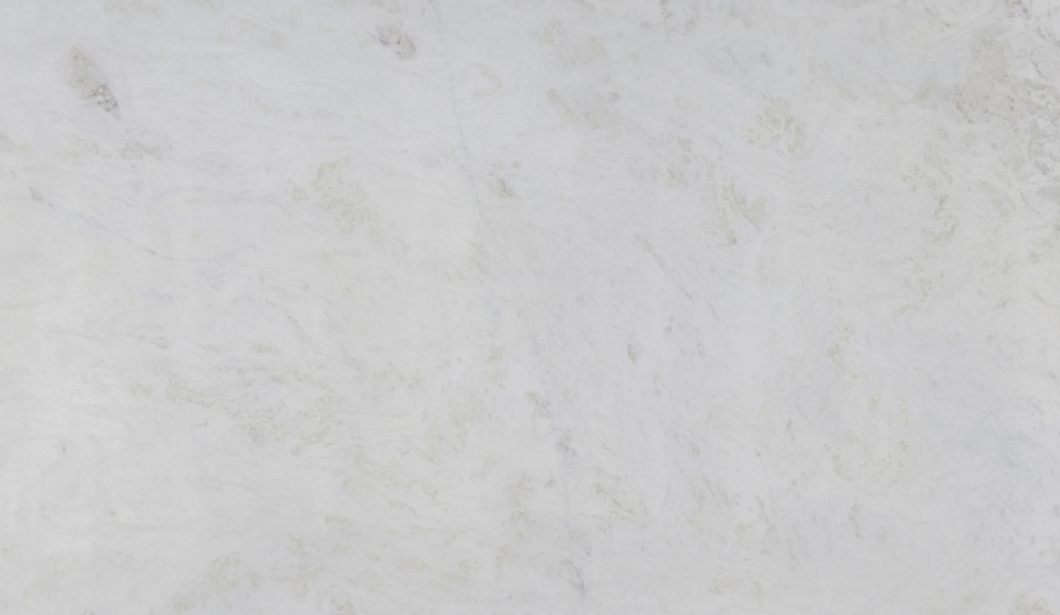 Calacatta Berrini marble countertops with soft white tones and subtle gray patterns, perfect for kitchen countertops by Granite Guy Inc.