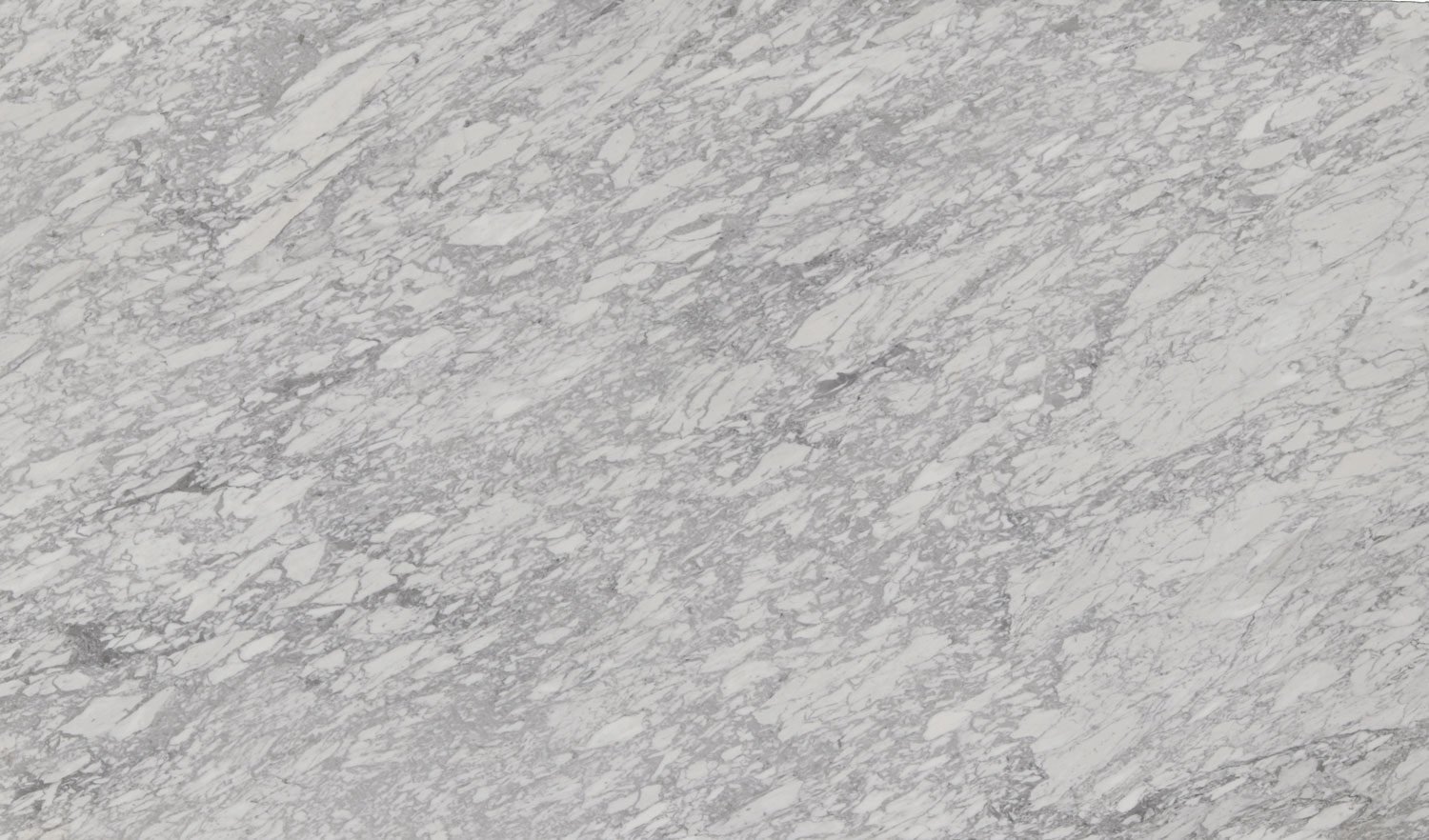 White Carrara Dark marble countertops with bold gray patterns, perfect for kitchen countertops and bar tops by Granite Guy Inc.