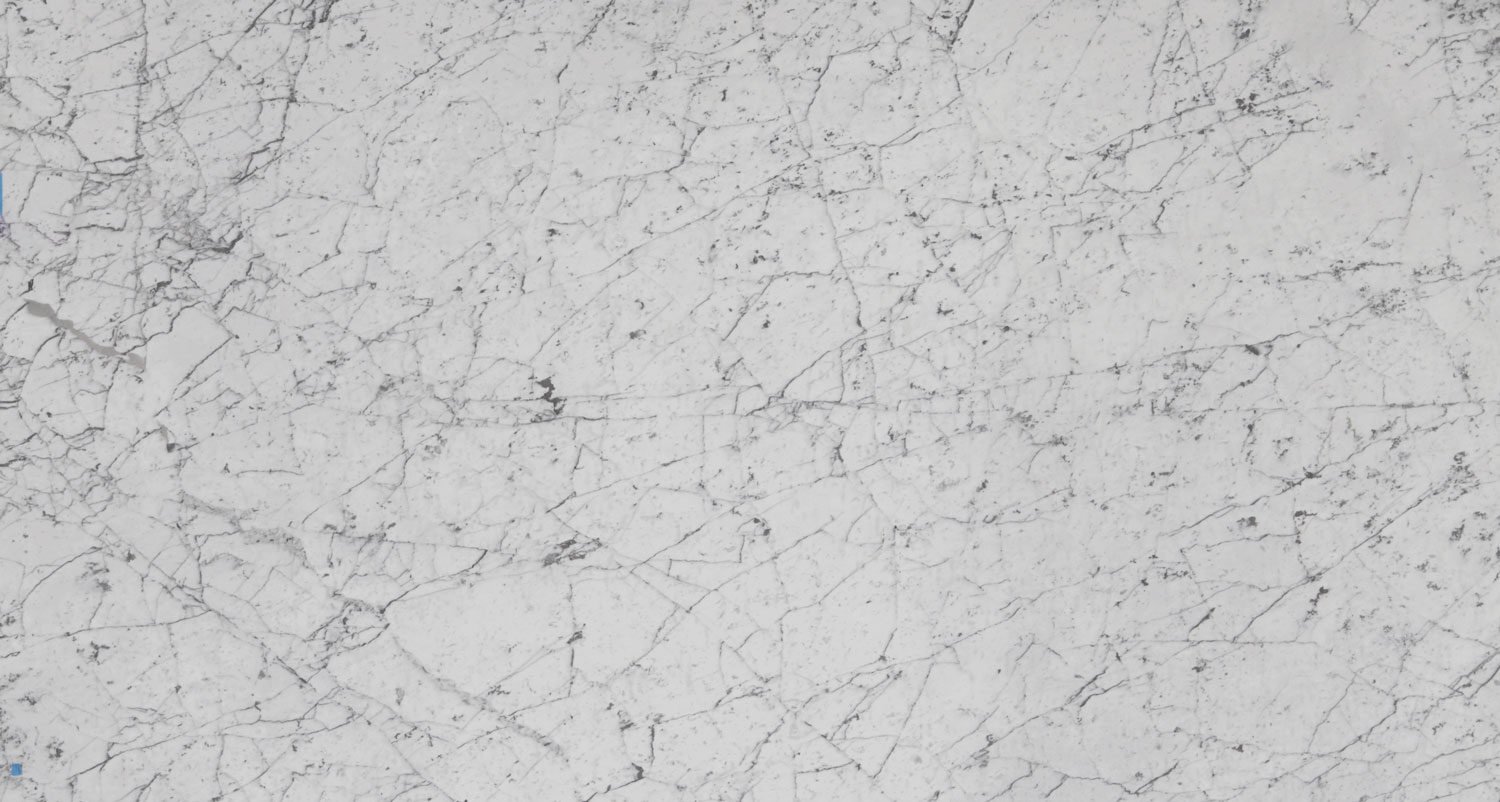 Bianco Carrara Extra marble countertops with refined gray patterning, perfect for luxury kitchen countertops by Granite Guy Inc.