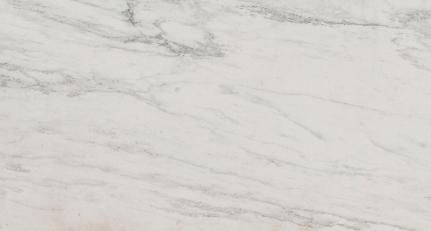 Bianco Danby marble countertops with soft white and gray patterns, perfect for kitchen countertops and bar tops by Granite Guy Inc.