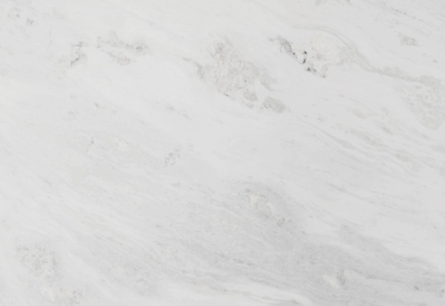 Bianco Olinda marble countertops with soft white and gray veining, perfect for kitchen countertops and bathroom vanities by Granite Guy Inc.