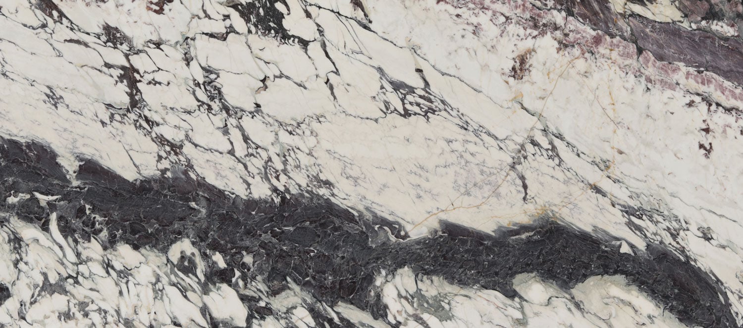 Breccia Capraia marble countertops with bold white, black, and purple veining, perfect for kitchen countertops by Granite Guy Inc.