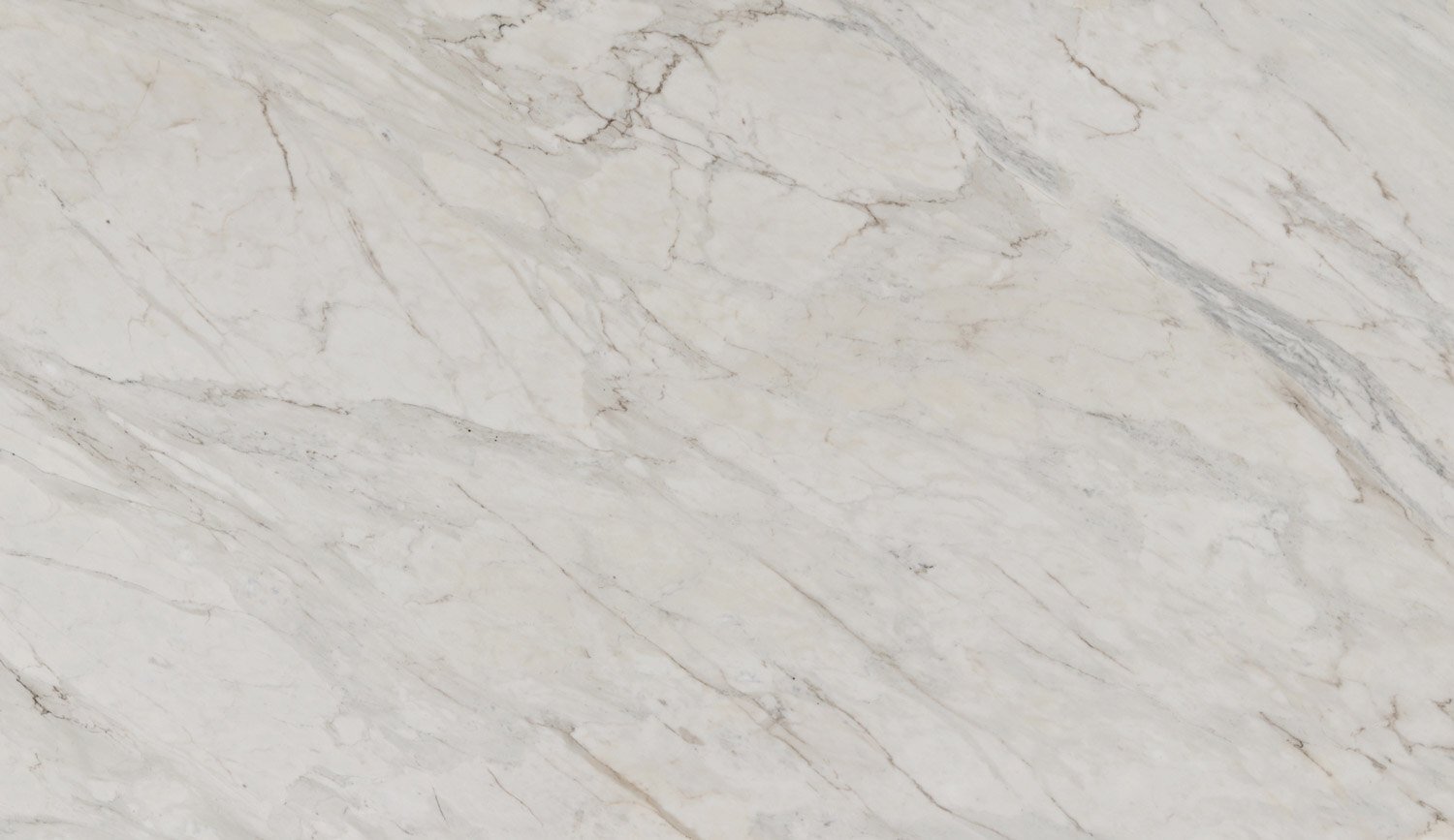 Calacatta Crema marble countertops with soft beige and gray veining, perfect for kitchen countertops and bathroom vanities by Granite Guy Inc.