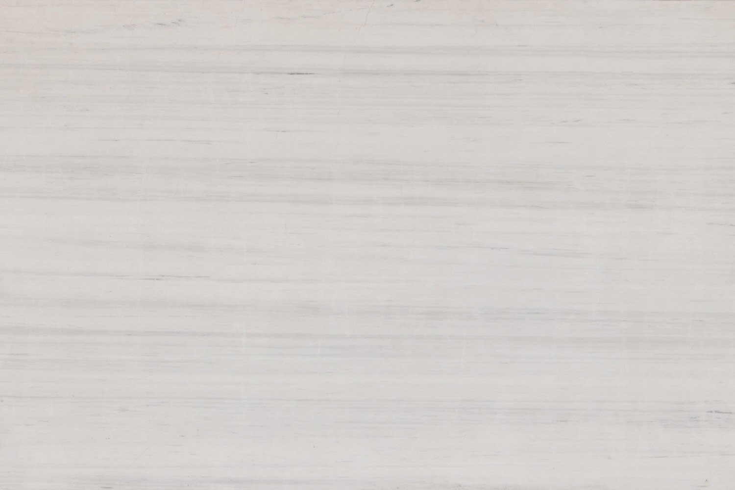 Dolomiti White marble countertops with soft linear patterns and a sleek white finish, perfect for kitchen countertops by Granite Guy Inc.