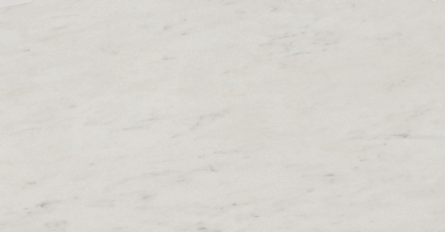 Olympian White Danby marble countertops with a clean white surface and soft gray veining, perfect for kitchen countertops by Granite Guy Inc.