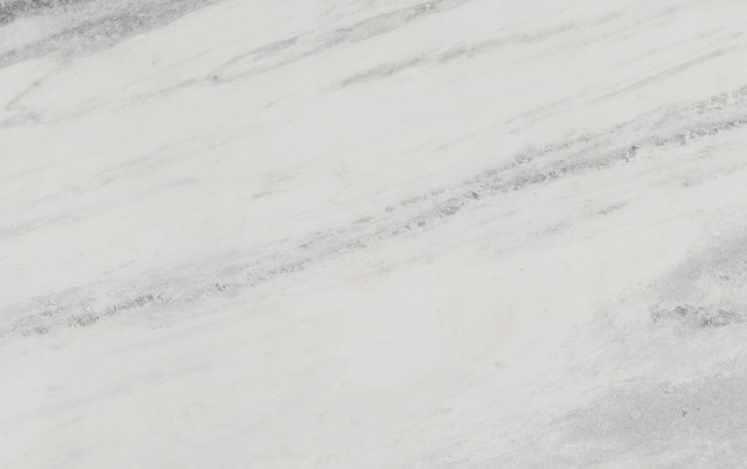 Shadow Storm marble countertops with soft white tones and elegant gray patterns, perfect for kitchen countertops by Granite Guy Inc.