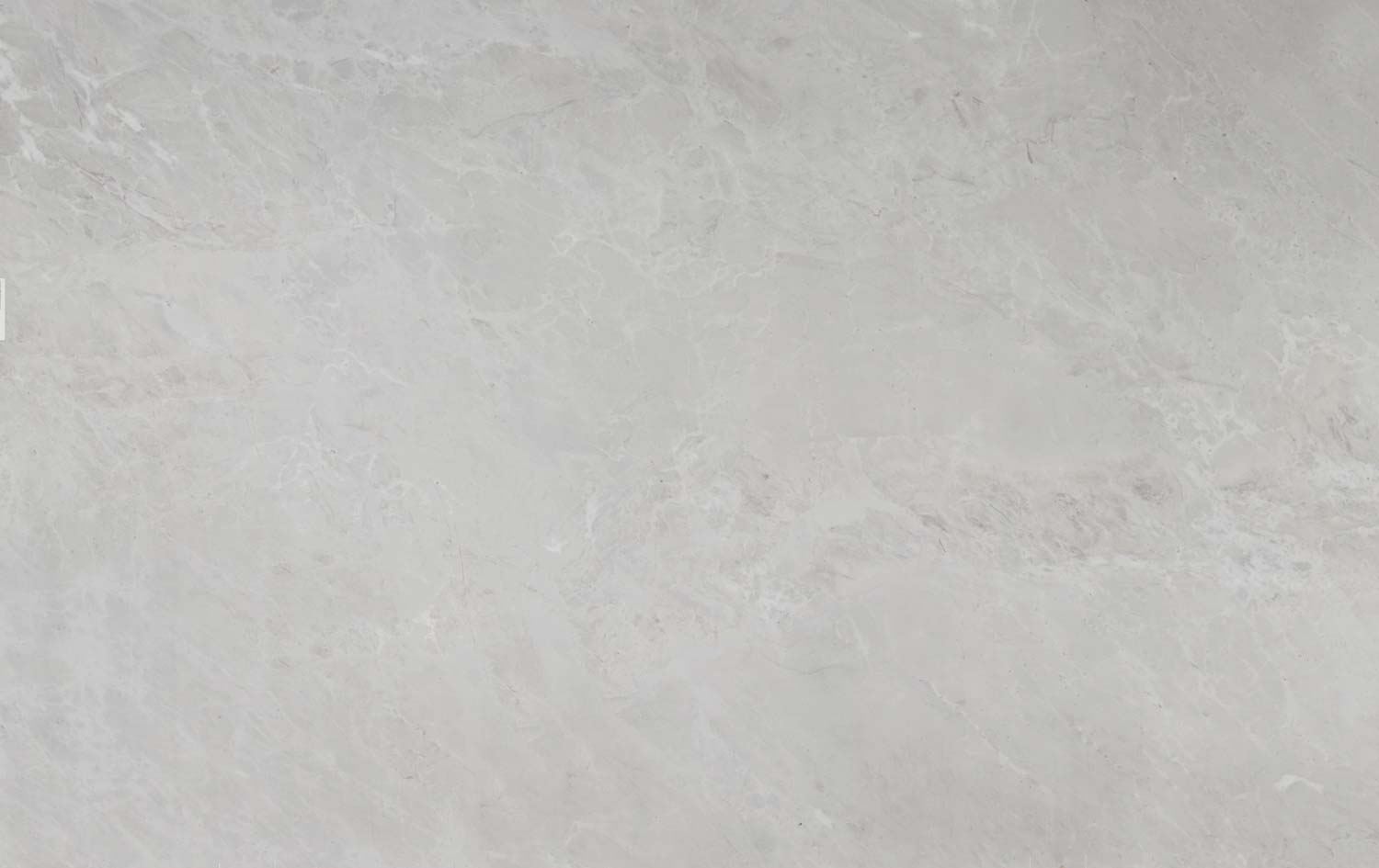 Sky White marble countertops with soft white tones and delicate gray patterns, perfect for kitchen countertops and vanities by Granite Guy Inc.