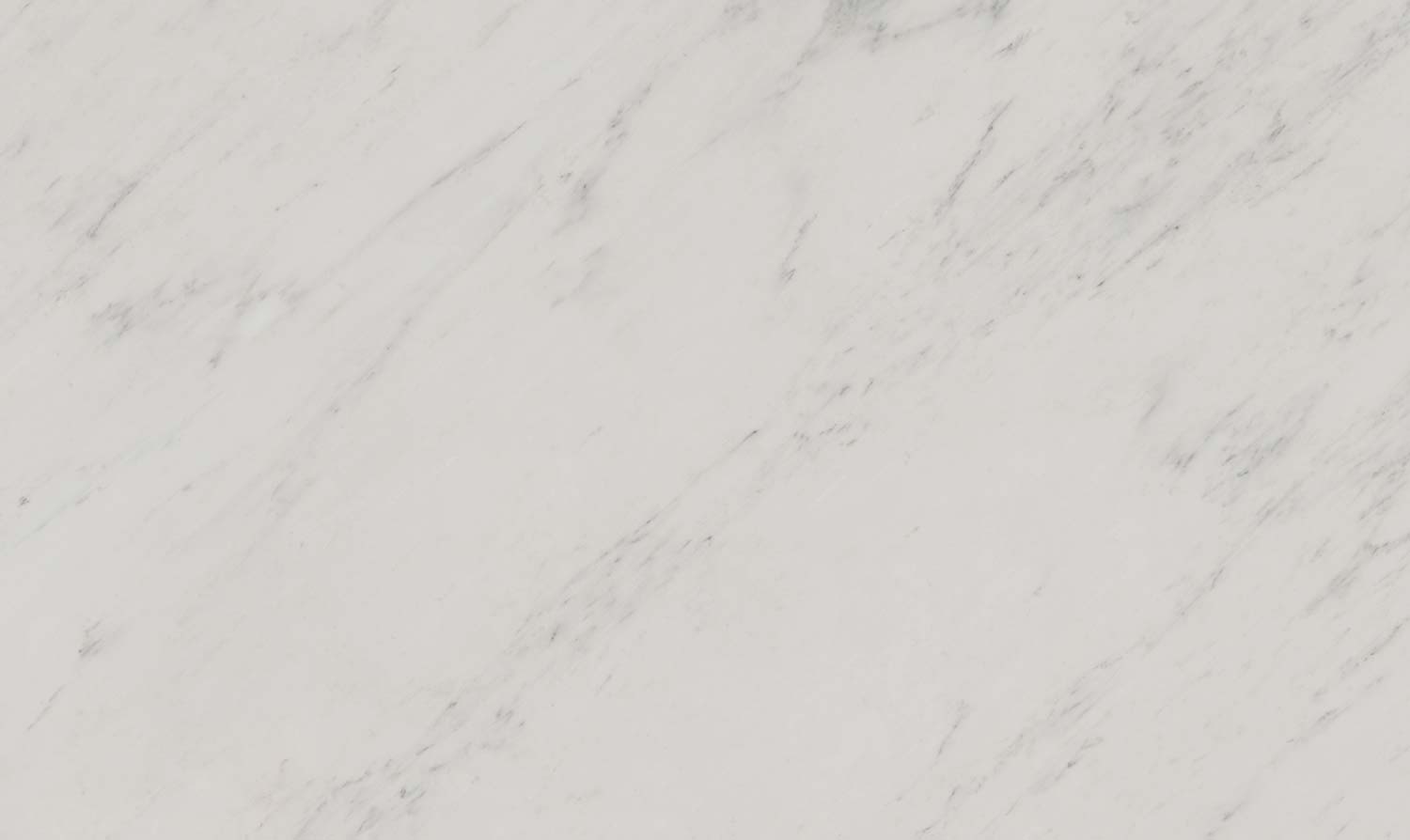 Statuario Bella marble countertops with a soft white background and delicate gray patterns, perfect for kitchen countertops by Granite Guy Inc.