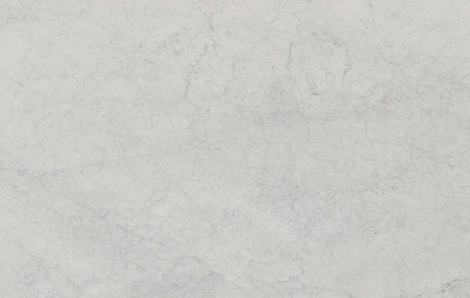 Venato Carrara marble countertops with delicate gray patterns, perfect for kitchen countertops and vanities by Granite Guy Inc.