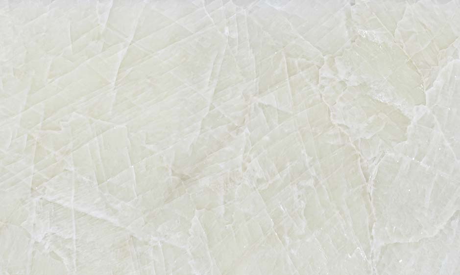 Onyx Alabastro White Polished countertops with subtle crystalline white texture for kitchen countertops. Onyx by Granite Guy Inc.
