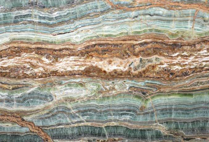 Onyx Esmeraldo countertops with vibrant green and brown patterns, great for kitchen countertops. Onyx by Granite Guy Inc.