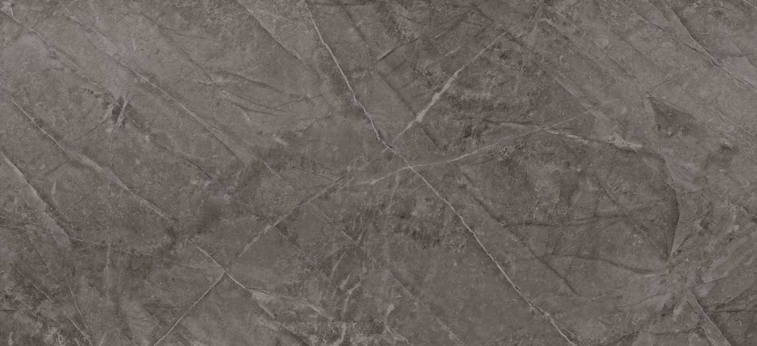 Dekton Kira porcelain kitchen countertops with warm taupe background and soft marble-like veining. Porcelain by Granite Guy Inc.
